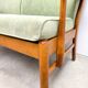 Two-seater sofa from the sixties with green upholstery