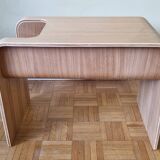 Boone coffee table in curved wood produced by Habitat, design