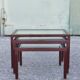 Nesting tables in burgundy lacquered metal and brass, France 1950s