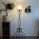 Vintage floor lamp in wrought iron and opaline.