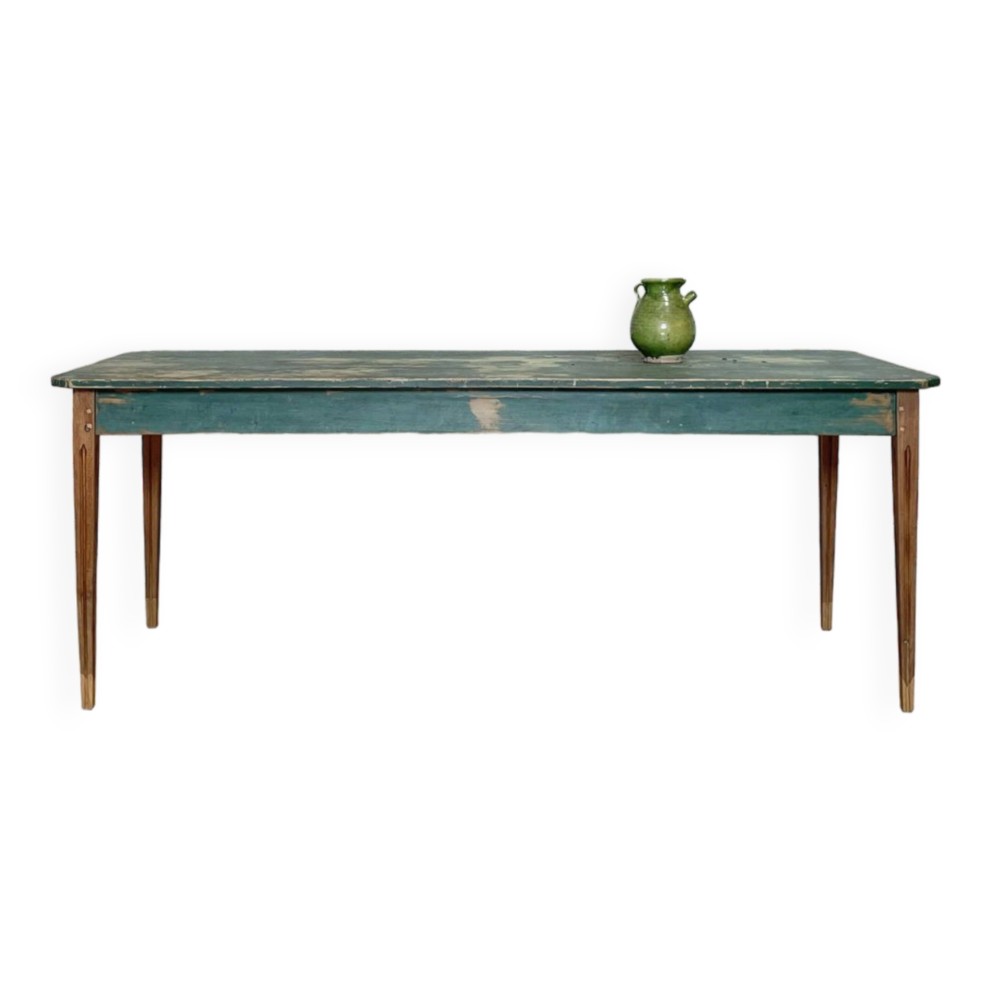 Vintage farm table with spindle legs.