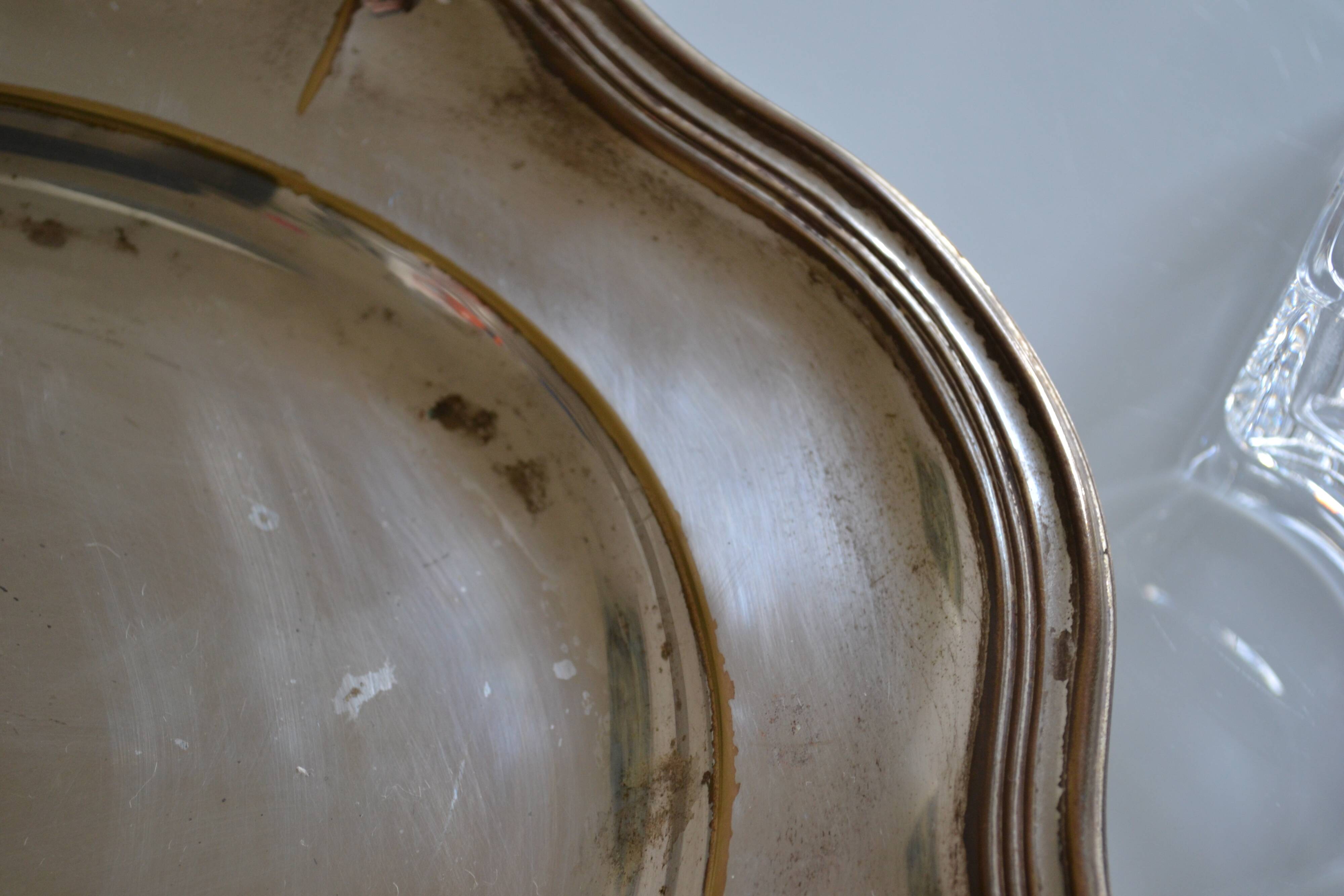 Silver-plated metal aperitif serving tray with HKE hallmark and glass.