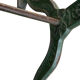 Old bistro table in engraved wrought iron