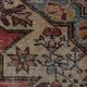 Vintage Turkish rug in beige and red with oriental design, 135 × 210 cm