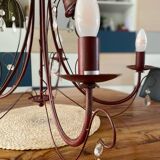 Deep red tassel and wrought iron chandelier