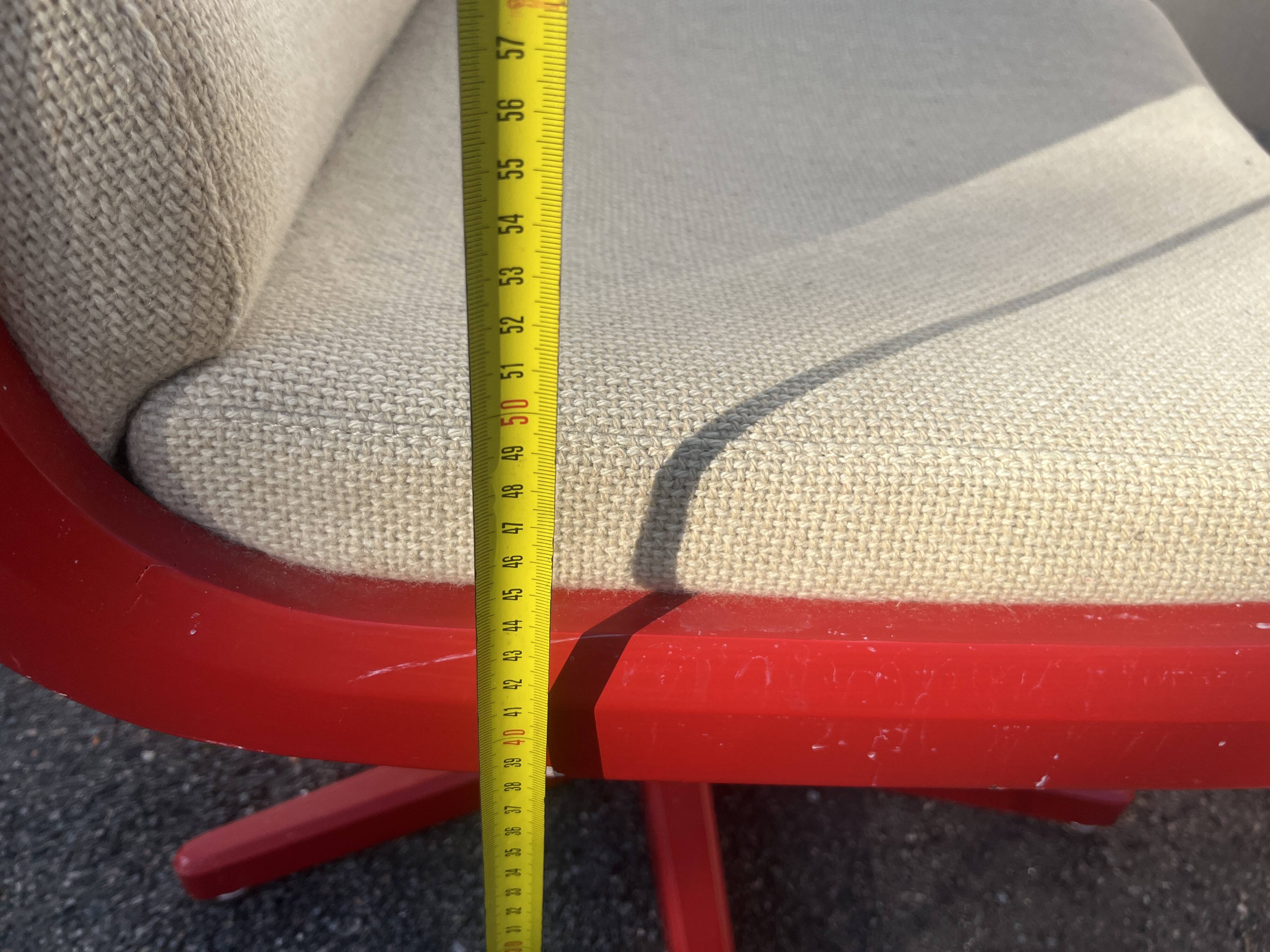 Set of 4 vintage 1970s swivel chairs in red and beige.