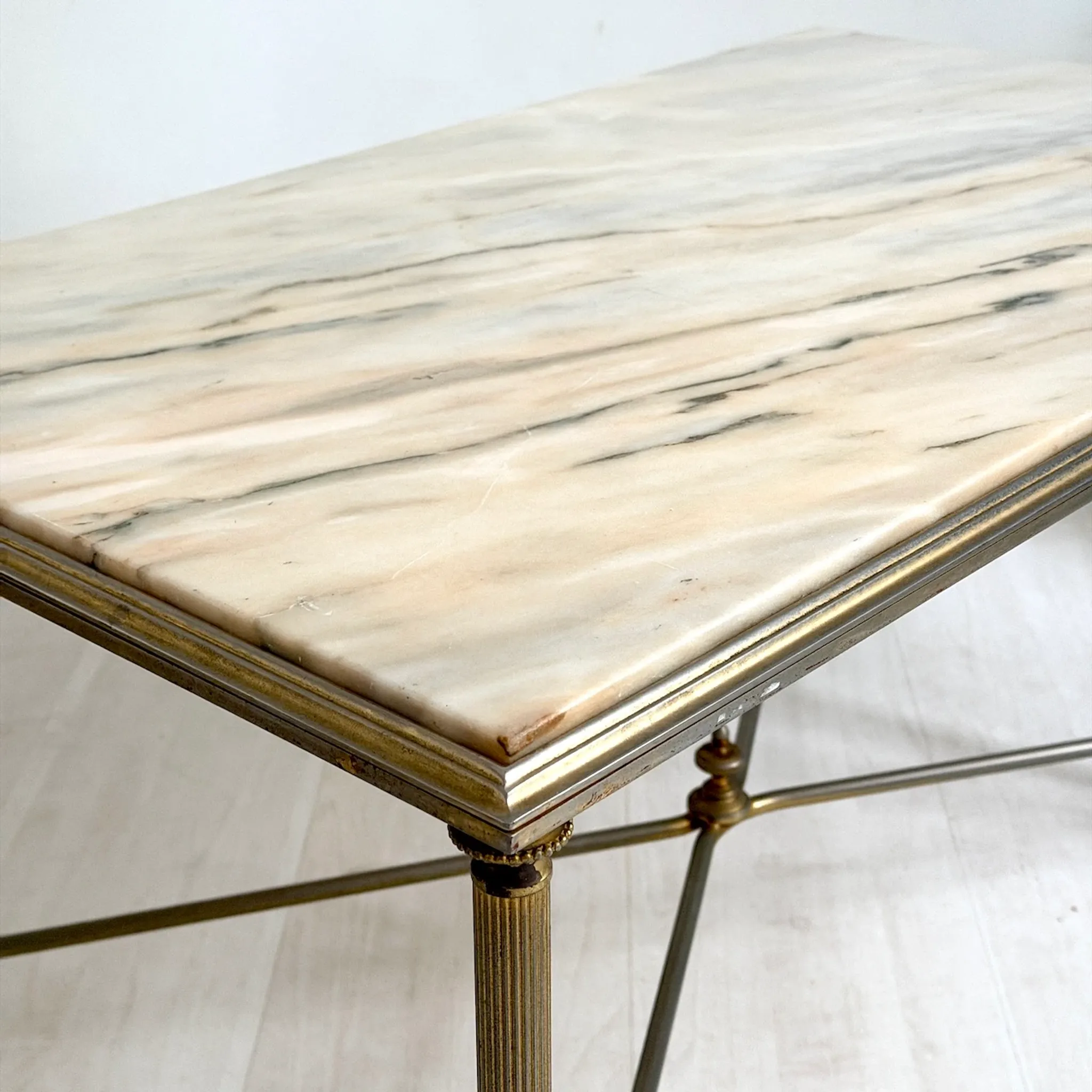 Vintage coffee table in 1970s neoclassical style.