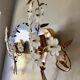 Pair of Italian wall lamps with a bouquet 1980