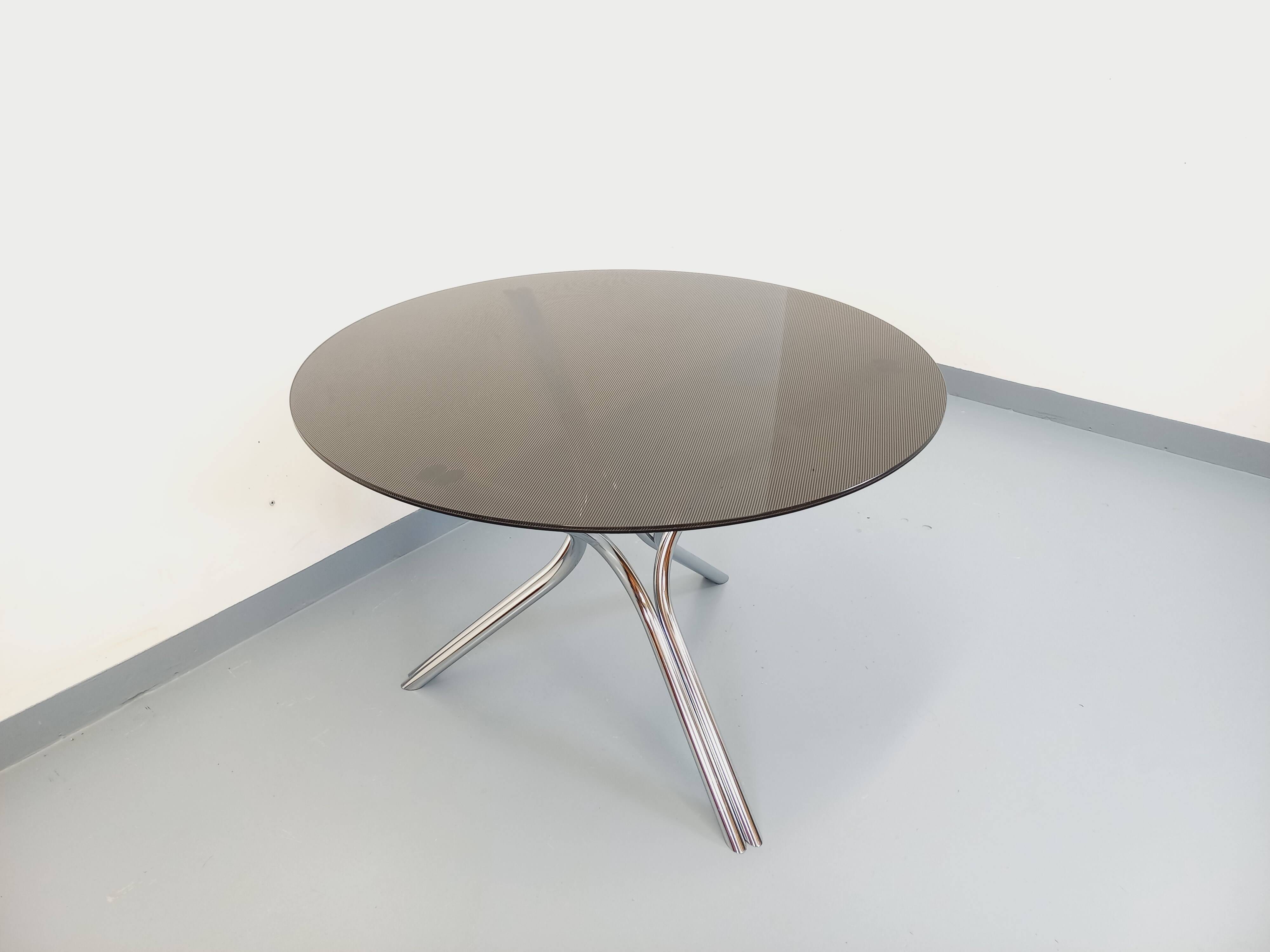 Vintage dining table in smoked glass plexiglass and chrome metal.