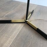 Designer floor lamp in black lacquered metal and brass