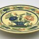 Assiette ancienne en faïence hb henriot quimper décor de panier floral et oiseau