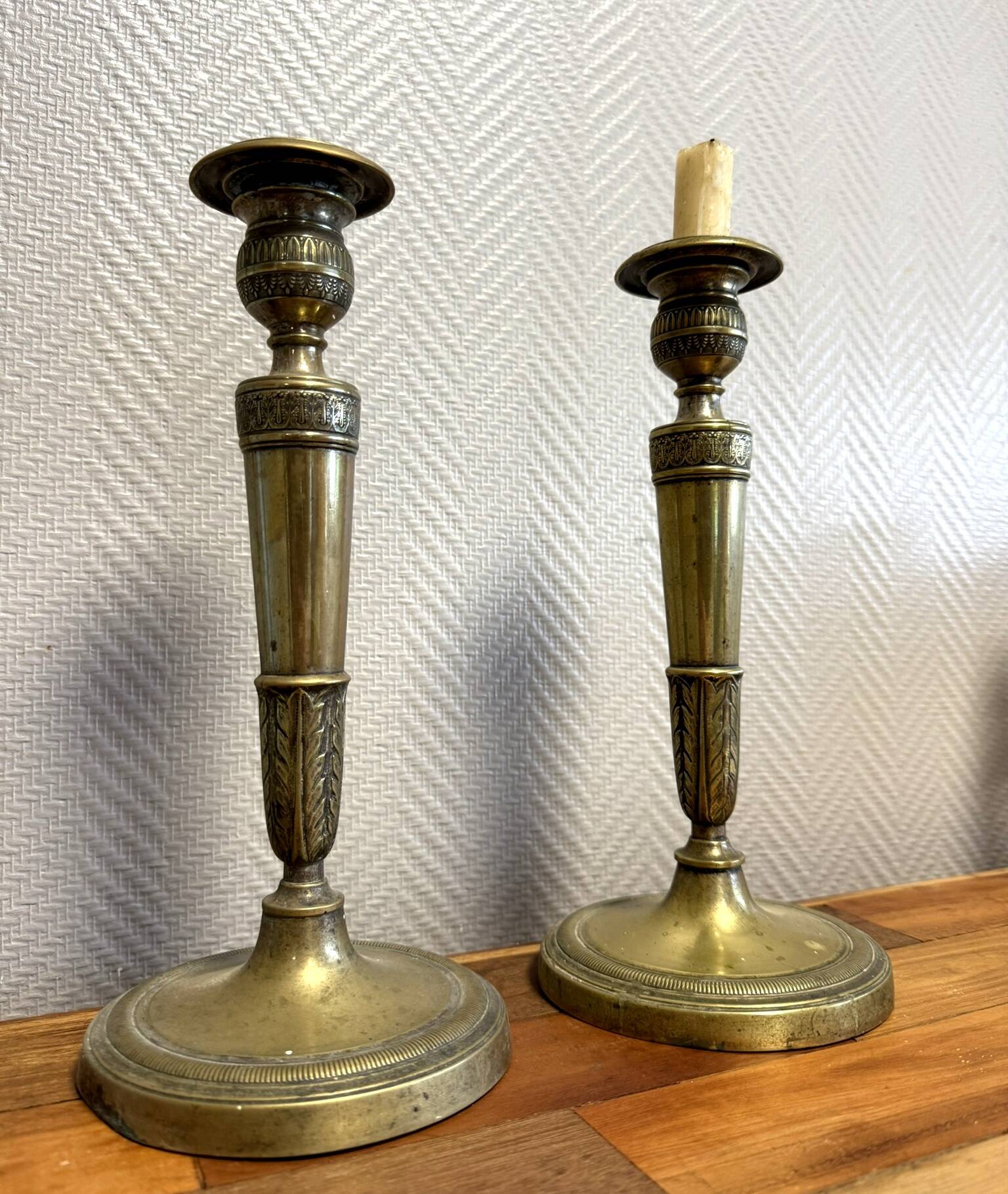 Pair of Empire period candlesticks in gilded bronze circa 1820