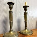 Pair of Empire period candlesticks in gilded bronze circa 1820