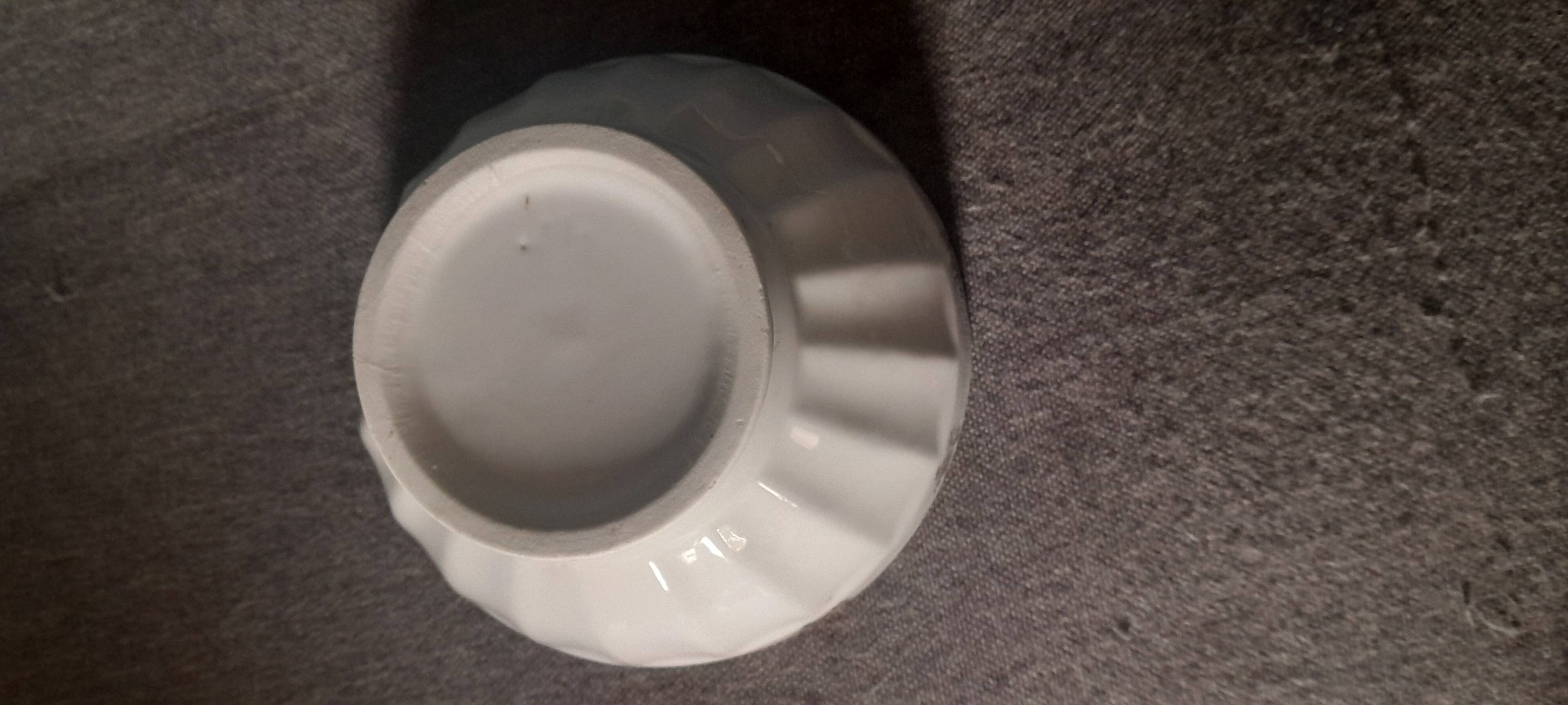 White earthenware bowl with decorative flowers