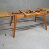 Dining table in blond oak compass feet 1950