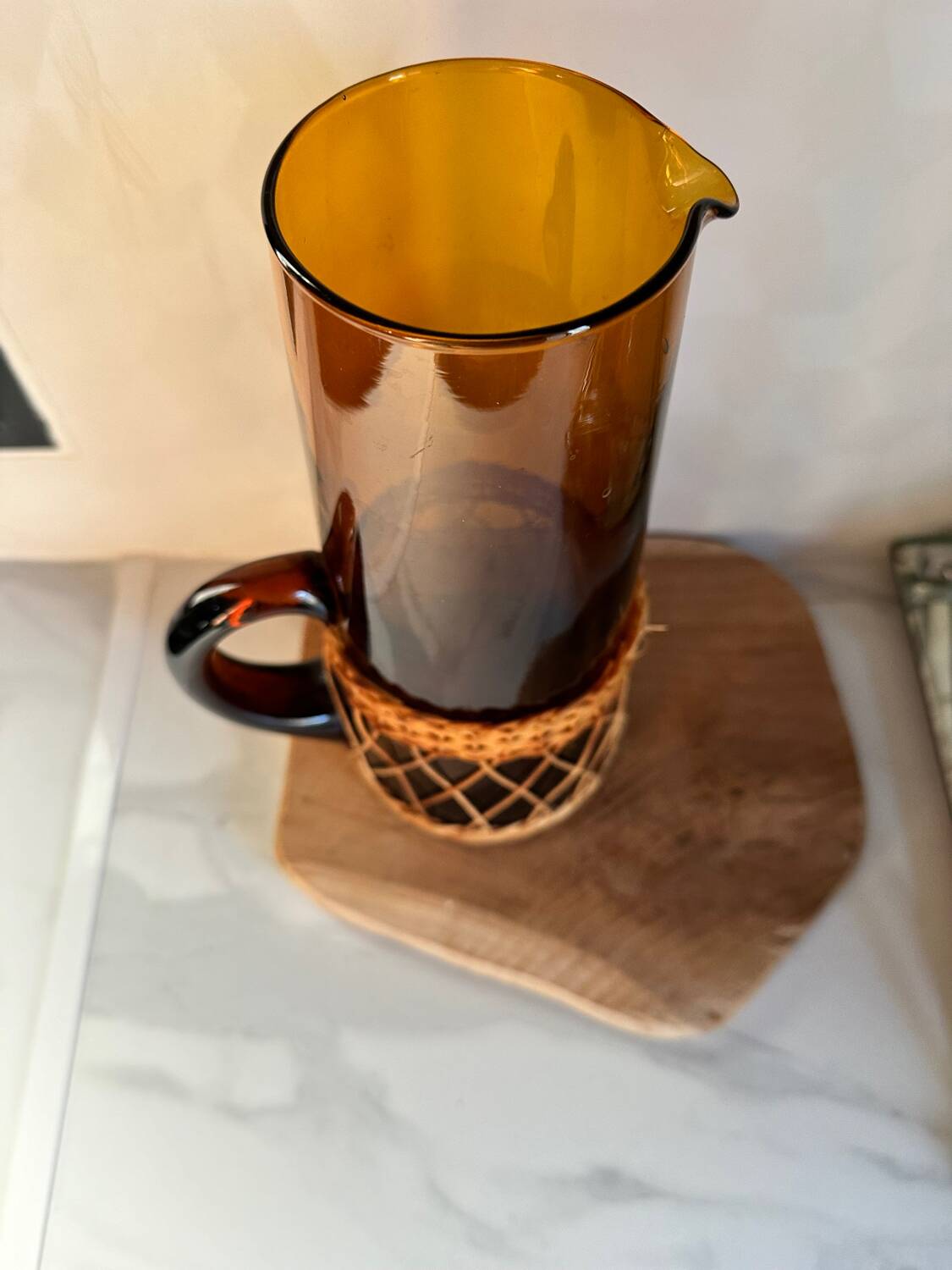 Vintage orange and wicker carafe