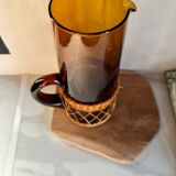 Vintage orange and wicker carafe