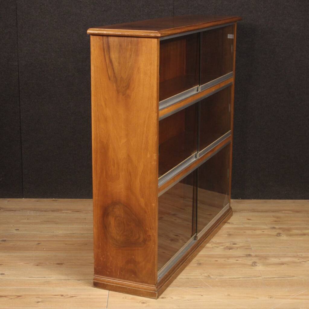 Pair of Italian bookcases in walnut wood with glass doors