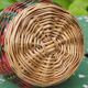 Glass and rattan carafe