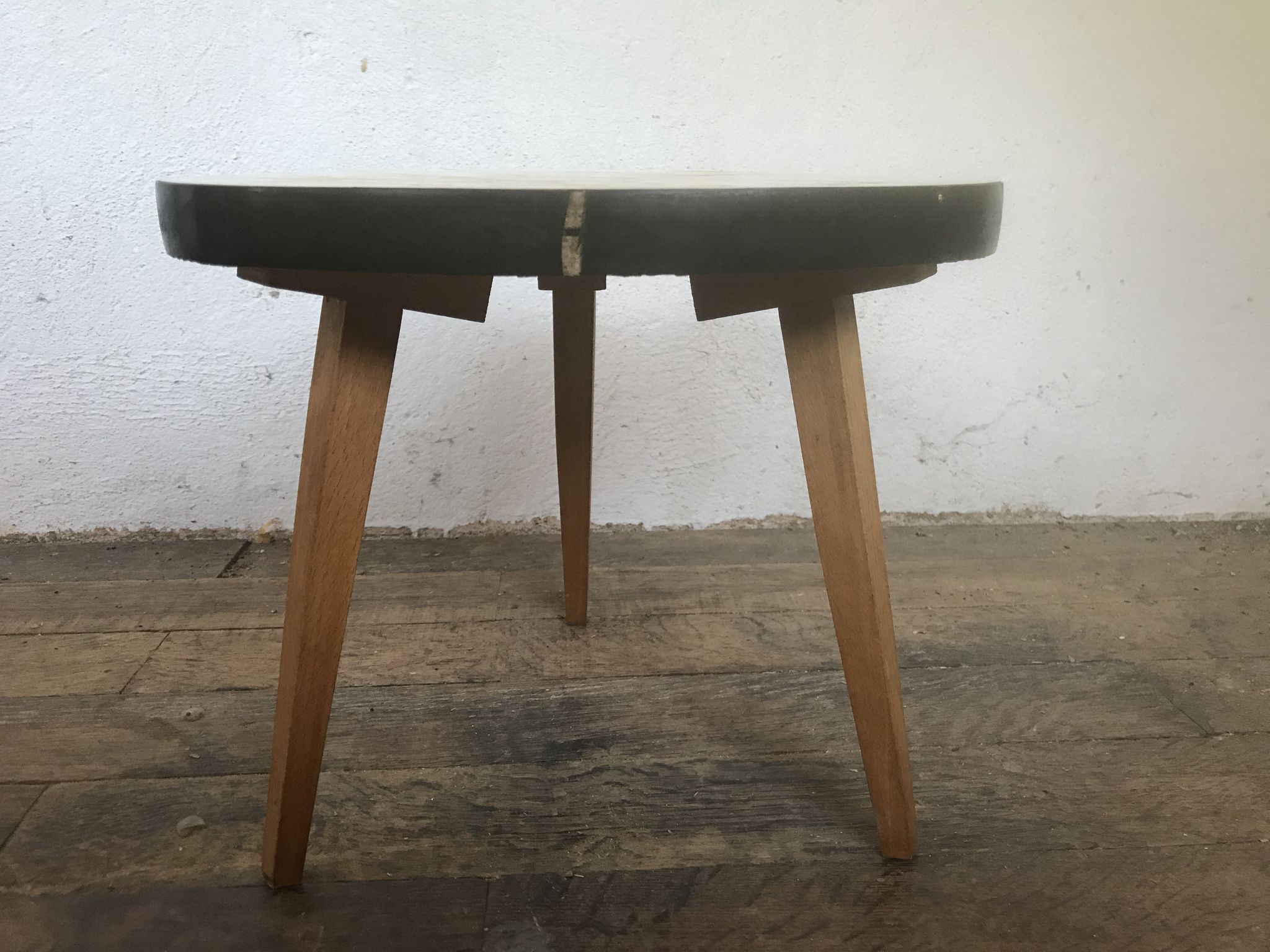 Small triangular table coffee table with a vintage tripod door midcentury plant 1950
