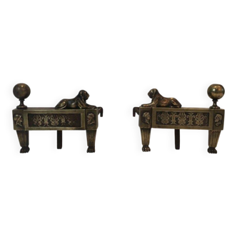 Pair of Empire period bronze andirons depicting reclining lions