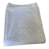 Vintage flat sheet for 2 people in cotton. Small blue and white patterns on a blue background