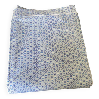 Vintage flat sheet for 2 people in cotton. Small blue and white patterns on a blue background