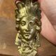 Bronze coat rack