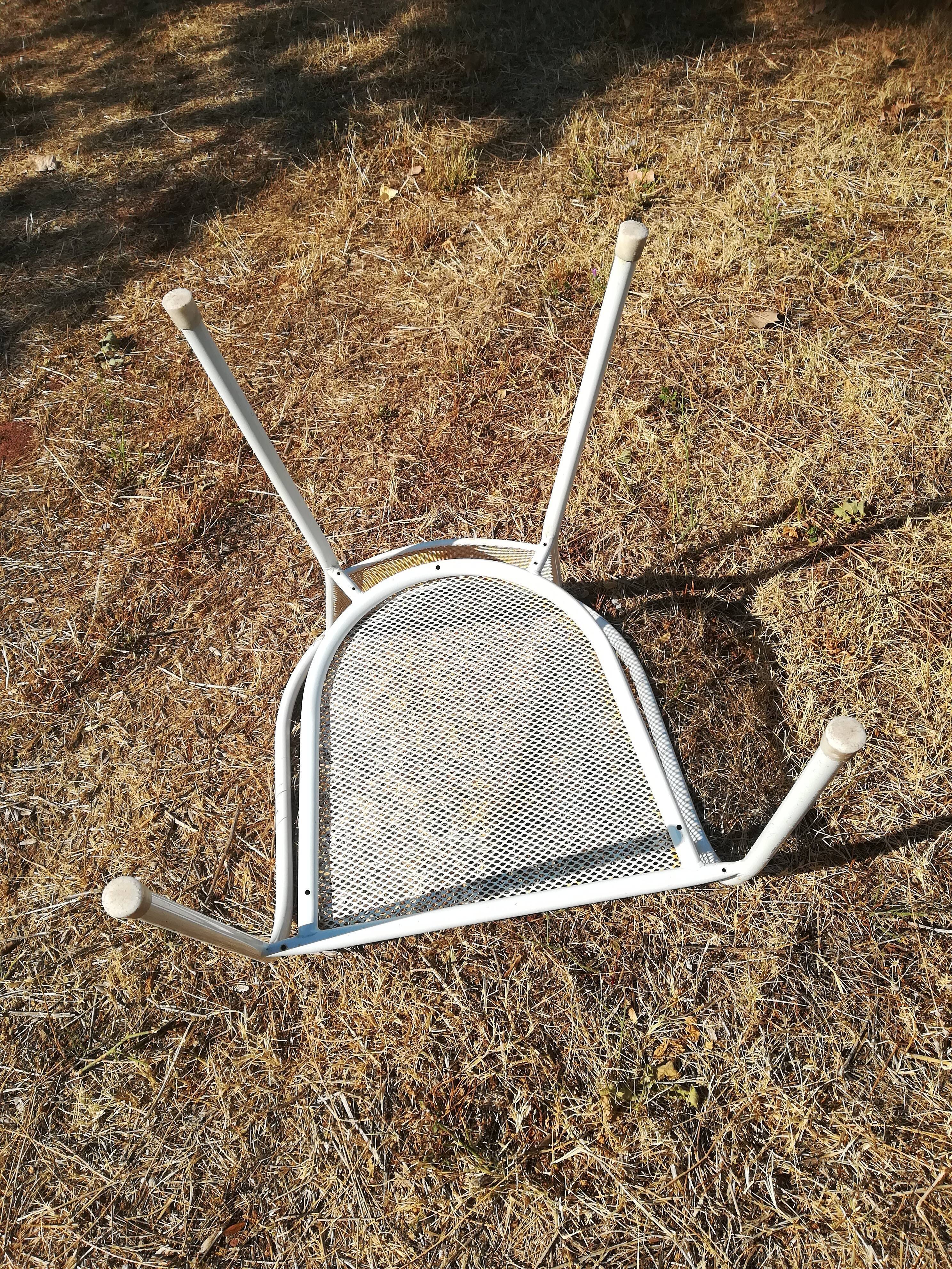Pair of vintage white metal terrace armchairs