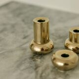 Trio of mid-century Swedish brass candle holders