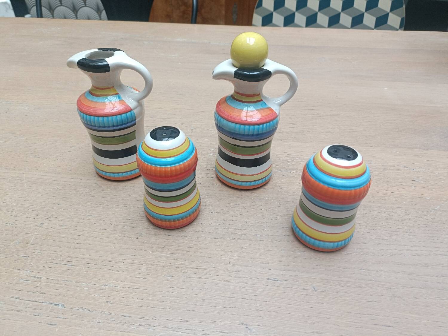Vinegar and oil set, salt shaker and pepper shaker.