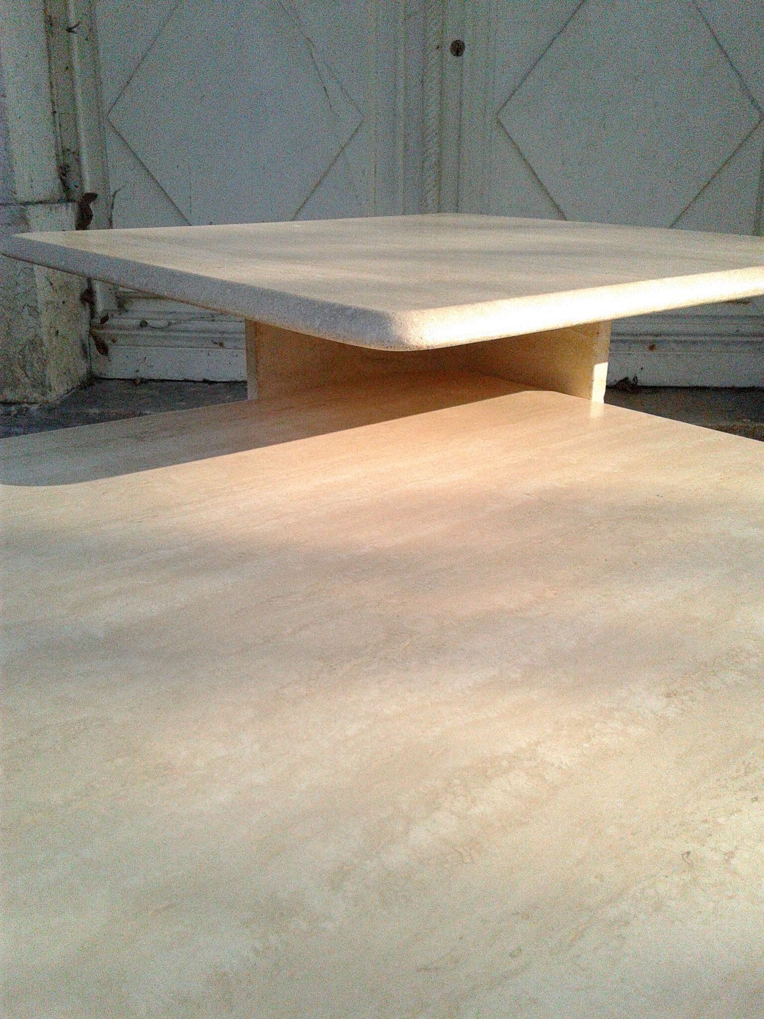 Two coffee tables giggle in travertine