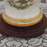 Table lamp with wooden base and fringed shade