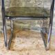 Chrome metal and smoked glass side table.