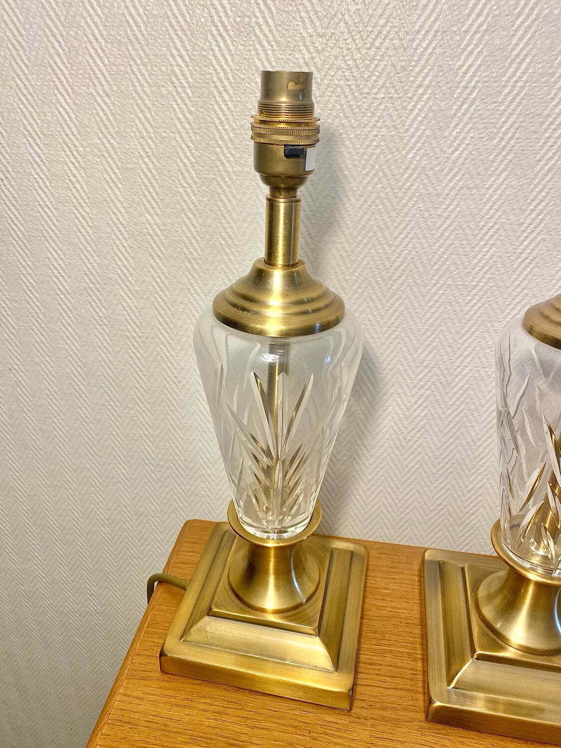 Pair of lamp bases in brass and cut glass.