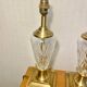 Pair of lamp bases in brass and cut glass.