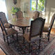 Solid oak dining table and 6 matching chairs.