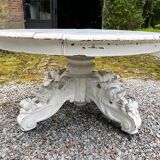 White lacquered oak table, richly carved central leg. Late 19th century
