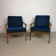 a pair of Scandinavian armchairs in teak from the 1960s