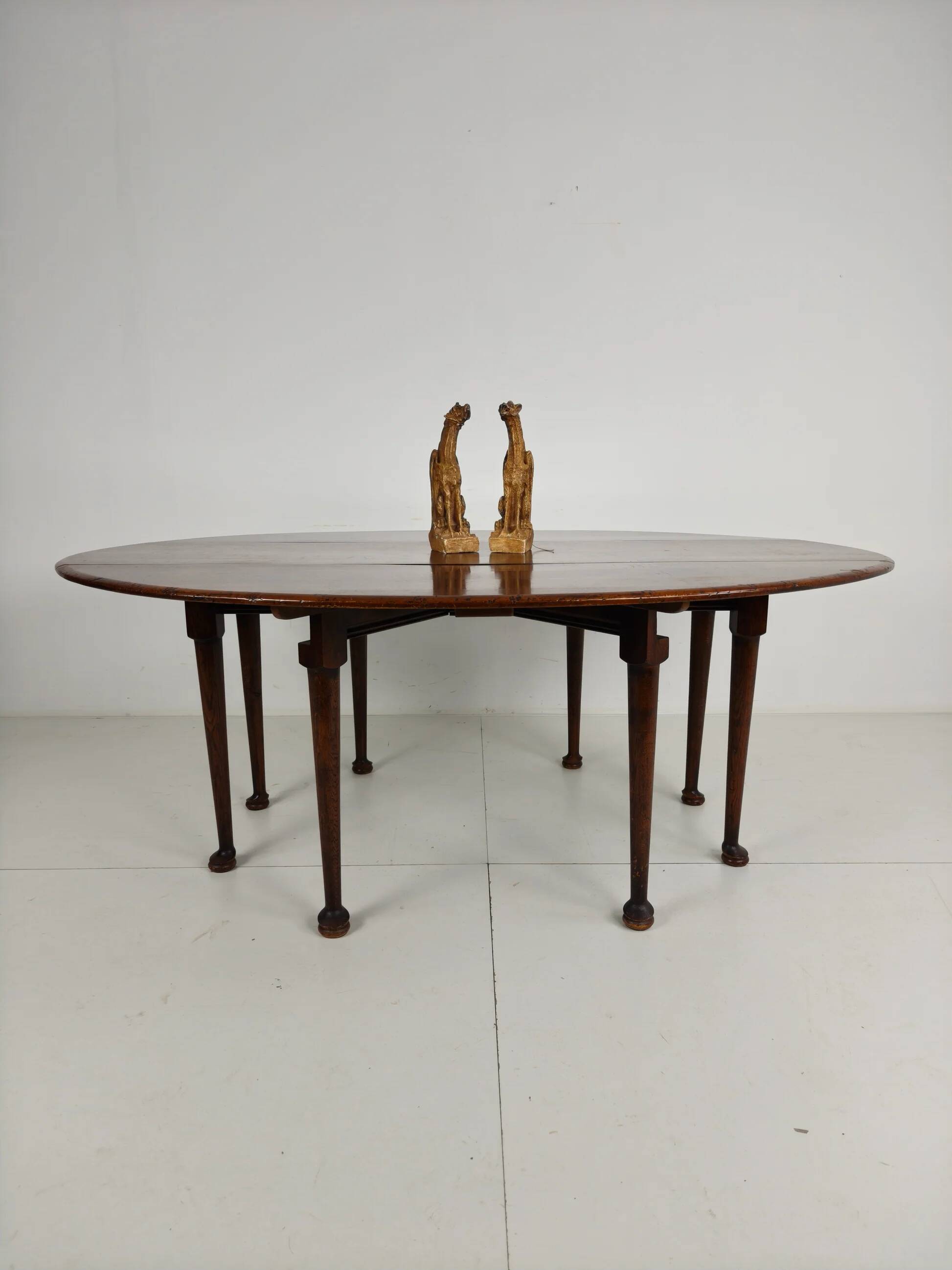 Antique English drop-leaf dining table – Victorian – 8 legs – oval shape – seats 8