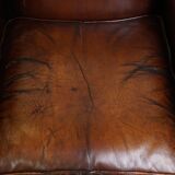 Vintage sheepskin armchair with beautiful warm colors and excellent seating comfort