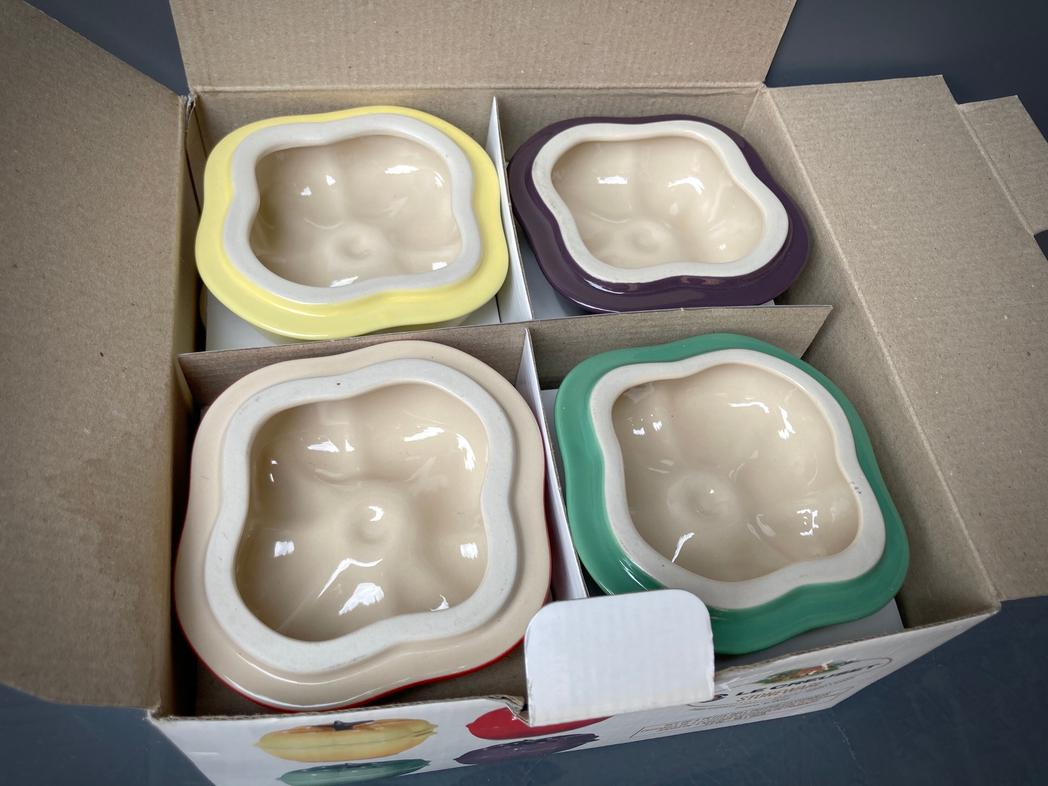 Four Le Creuset ceramic casseroles