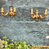 Paire d'appliques en bois doré