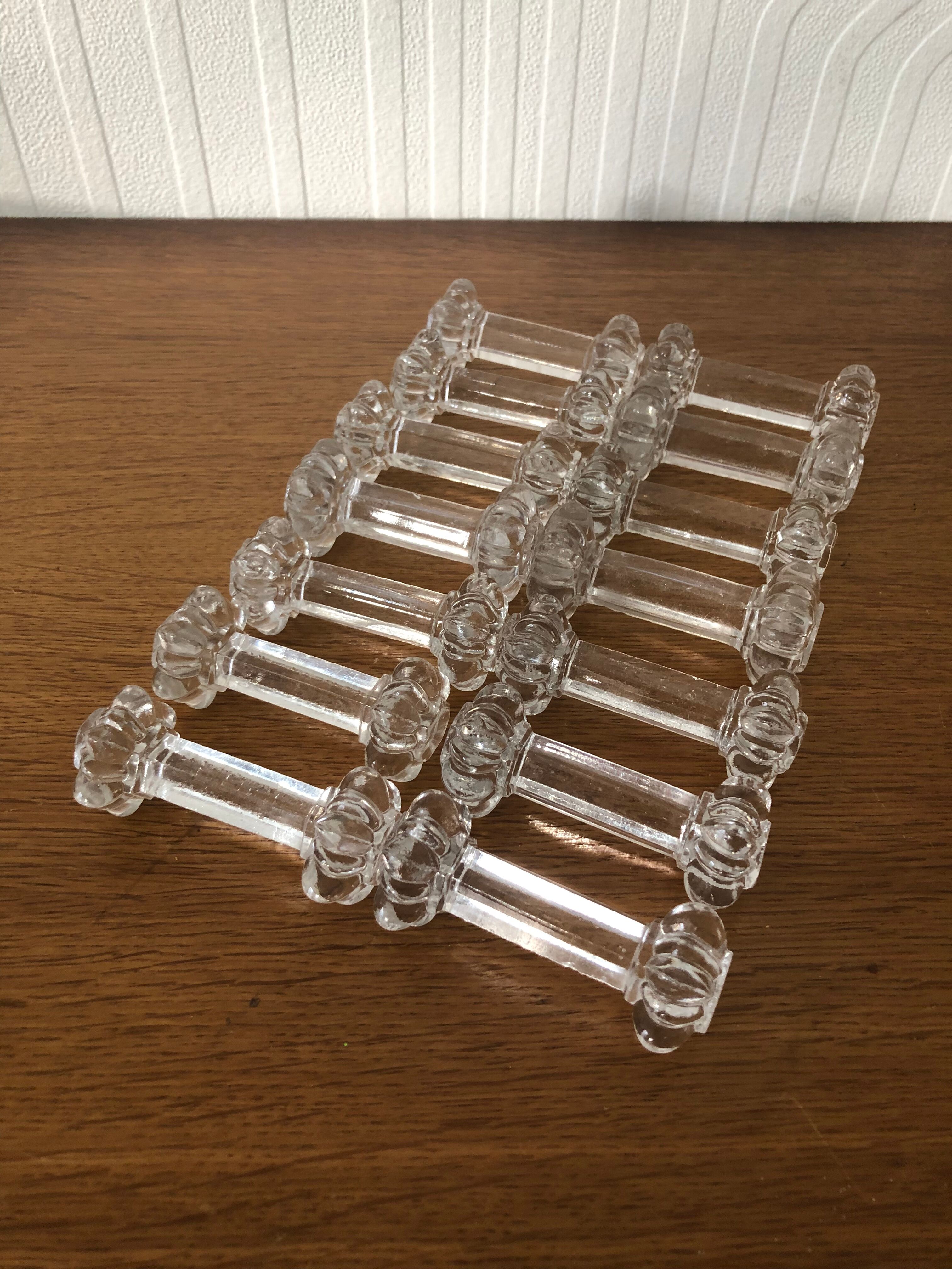 14 glass knife holders cut with "flower" motifs