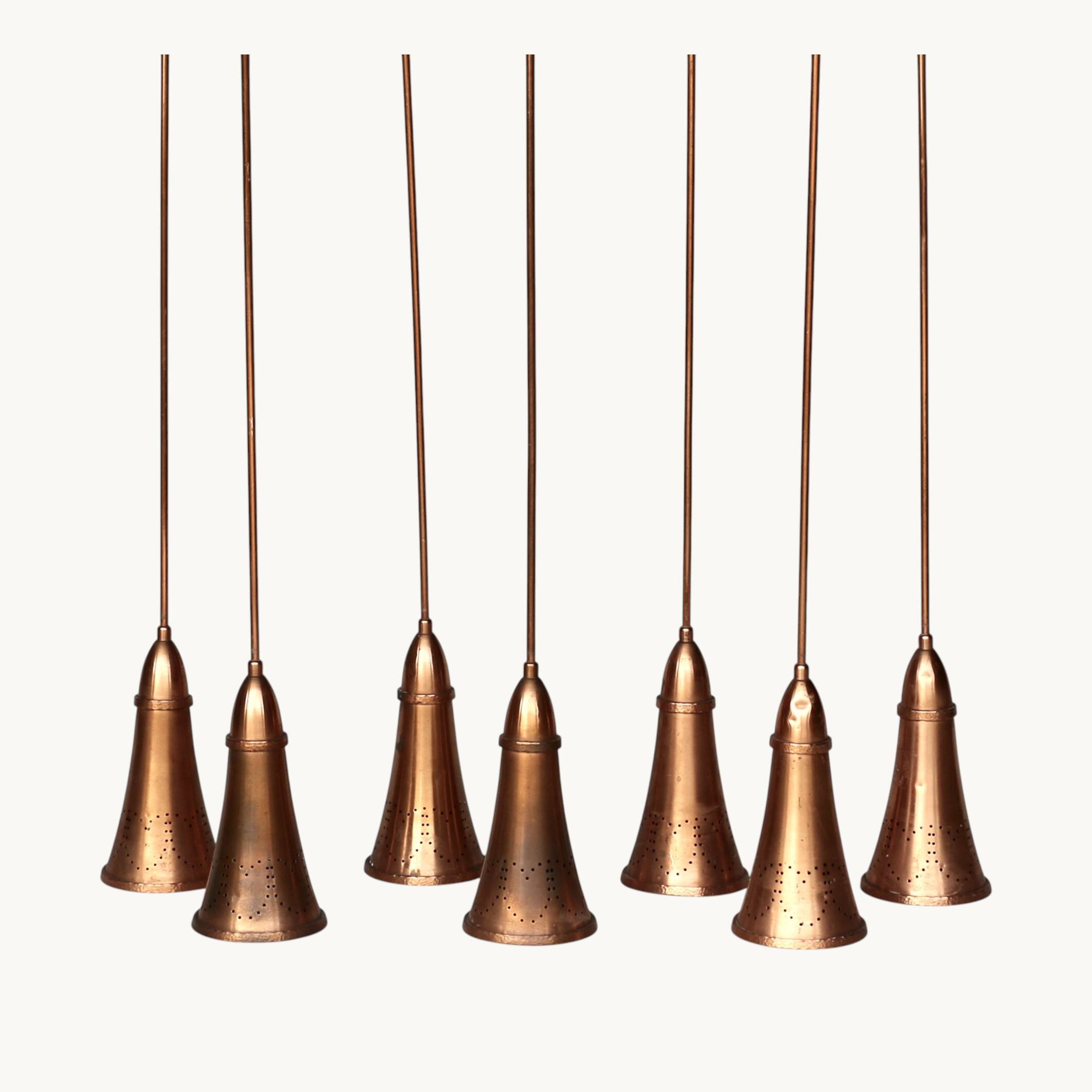 A set of 7 pendants. France 1960s.