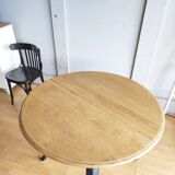 Antique extendable round table with Louis XV style extension