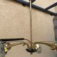 Brass and moulded glass chandelier, Bakelite arrow, 1950s, 5 lamps.