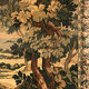 Tapestry decorated with a pink flamingo in a green landscape, woven by hand
