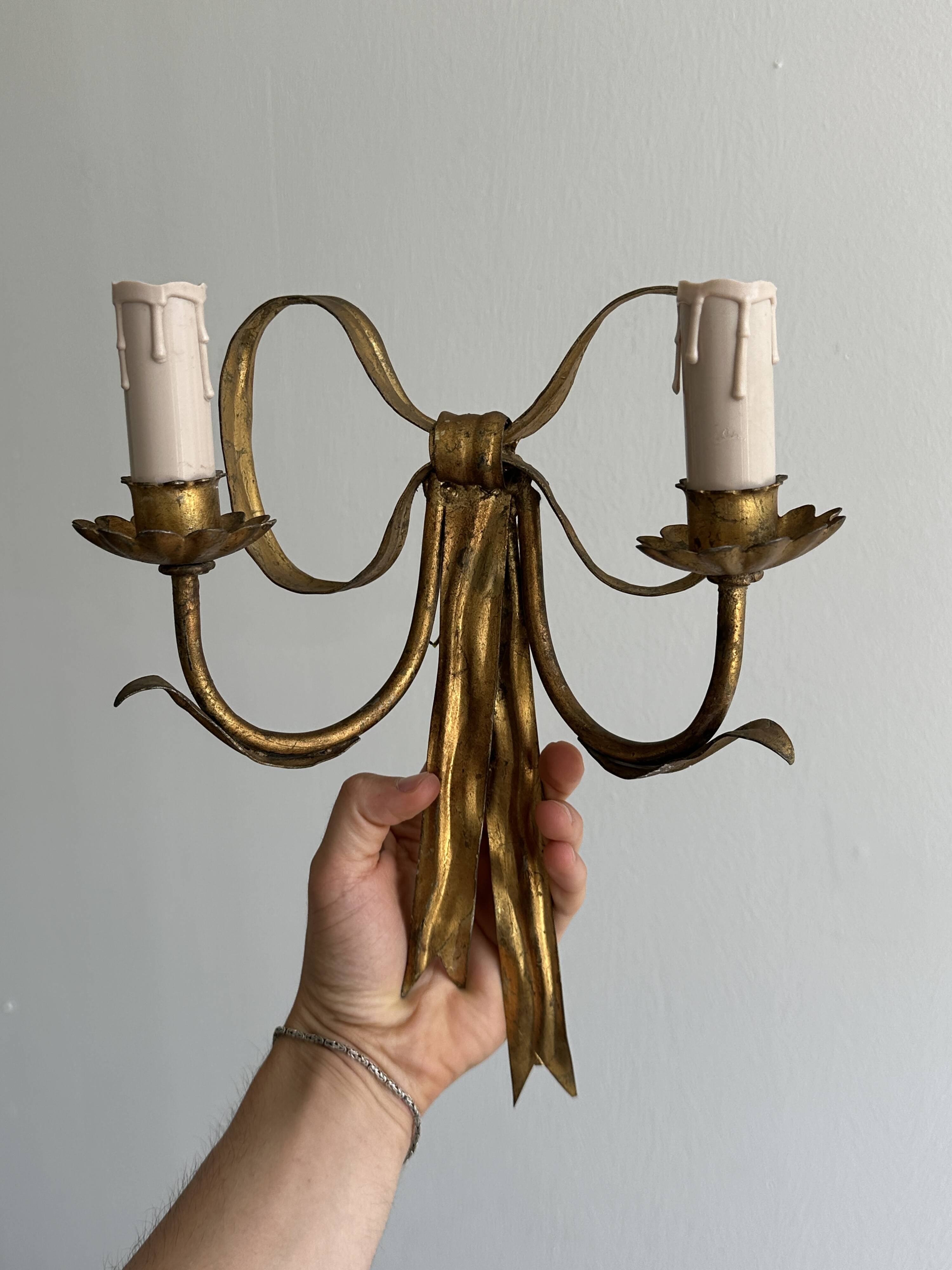 pair of antique metal wall lights