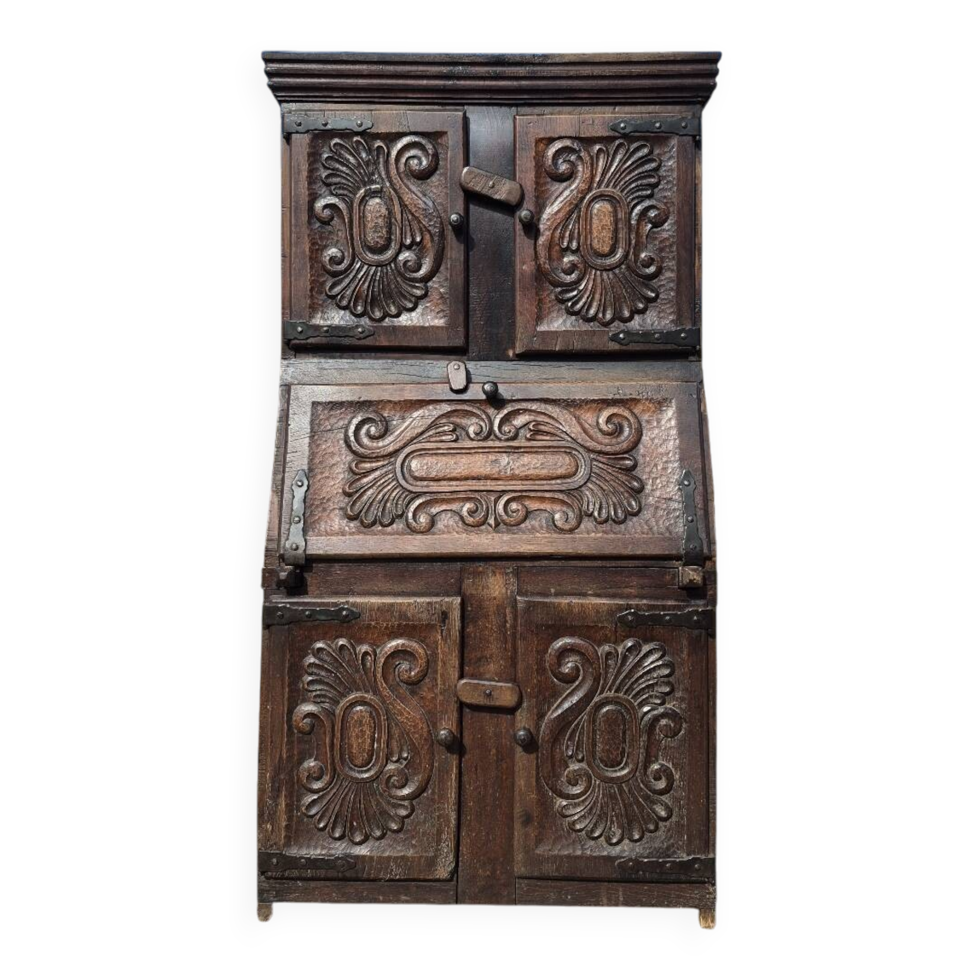 antique cabinet with carvings and wrought iron fittings rural